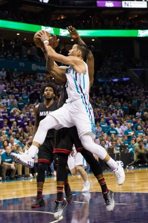 Apr 25, 2016; Charlotte, NC, USA; Charlotte Hornets guard Jeremy Lin (7) goes up for a shot against the Miami Heat during the second half in game four of the first round of the NBA Playoffs at Time Warner Cable Arena. The Hornets defeated the Heat 89-85. Mandatory Credit: Jeremy Brevard-USA TODAY Sports