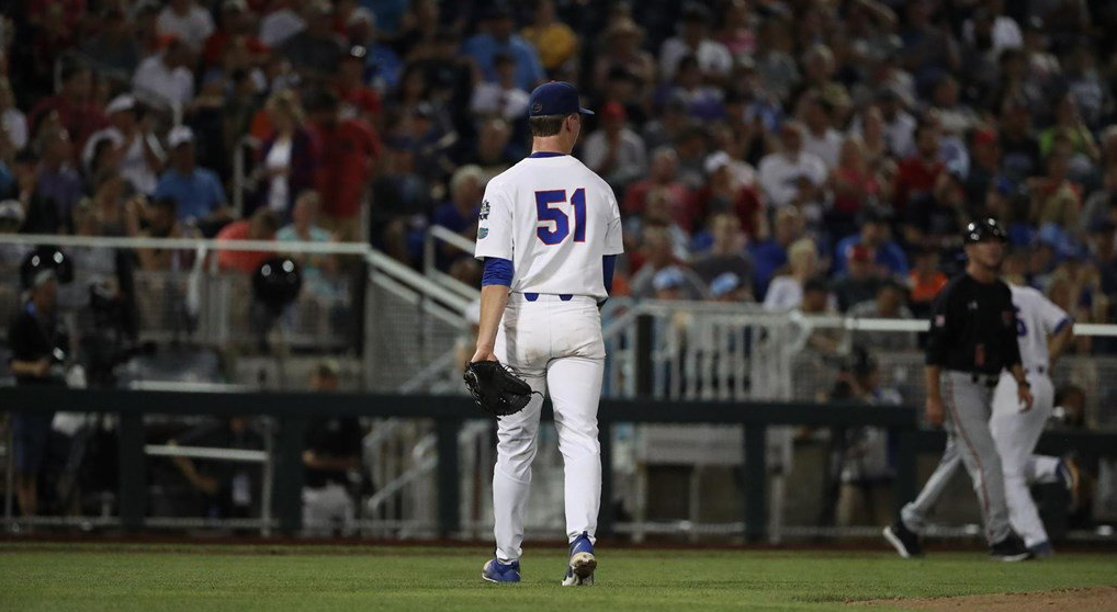 Florida Gators starting pitcher Brady Singer (51) yells in the