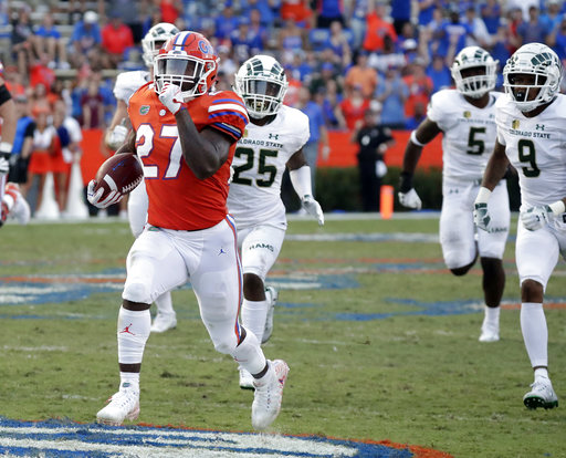 Florida Gators running back Dameon Pierce runs with the ball