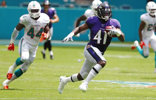 Ravens Crush Dolphins in Record-Breaking Victory - ESPN 98.1 FM - 850 AM  WRUF