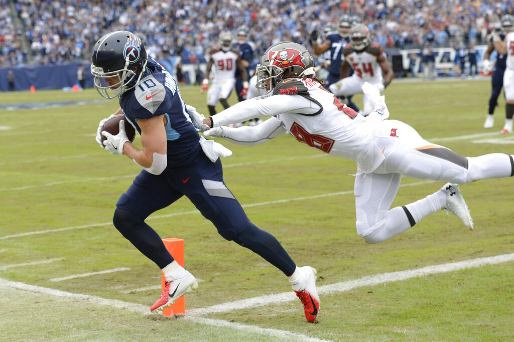 Titans force four turnovers in 27-23 win