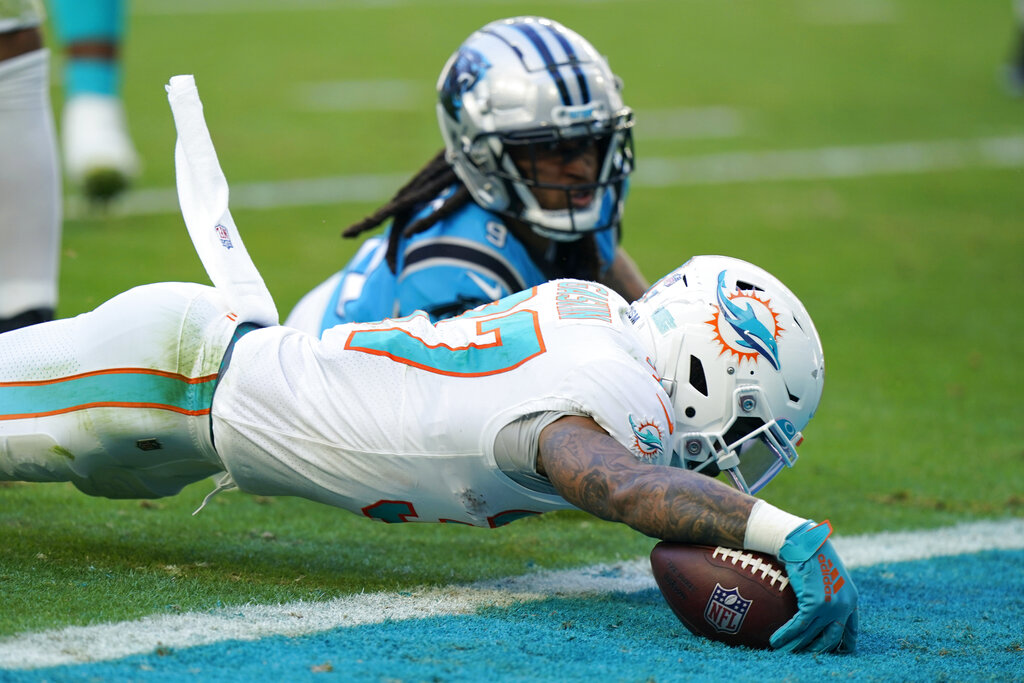 Carolina Panthers' Stephon Gilmore returns an interception against