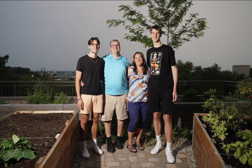 Olivier Rioux (right) comes from a tall family. His brother (from) left is 6-foot-9, while his father is 6-8 and his mother is 6-2.