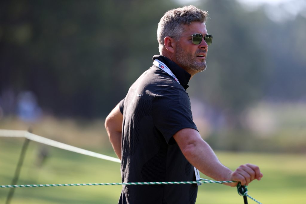 Florida men's golf head coach J.C. Deacon watches Parker Bell during Round 2 of the U.S. Open on Friday. 