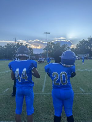 P.K. Yonge players look on as team lines up on defense