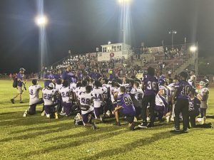 Gainesville High School Coach Ian Scott addressing the team.