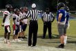 St. Francis Catholic and DeWitt Taylor meet at midfield for the pregame coinflip. [Charlie Jones]