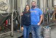 Former Gators lineman Jim Barrie (right) and his wife Brittney opened BarrieHaus Beer Co. in Ybor City in 2019.