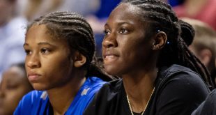 WNBA star Rhyne Howard (right) is in her second year as an assistant coach on the UF women's basketball team.