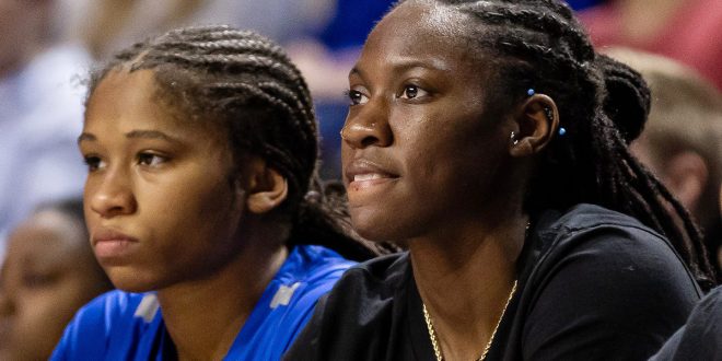 WNBA star Rhyne Howard (right) is in her second year as an assistant coach on the UF women's basketball team.