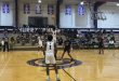 Cornelius White (4) faces off with Marlin Haywood (15) for the tipoff.