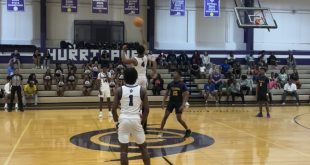 Cornelius White (4) faces off with Marlin Haywood (15) for the tipoff.