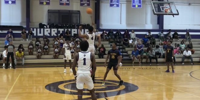 Cornelius White (4) faces off with Marlin Haywood (15) for the tipoff.